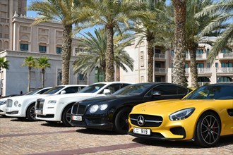 Luxury cars at the entrance of the Madinat Jumeirah Resort in Dubai