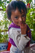 Young tibetan child in a guest house along the Kailash Kora