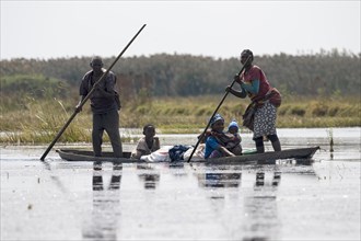 Local family in canoe