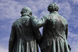 Rear view of double statue Goethe-Schiller monument by Ernst Rietschel