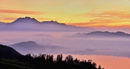 Evening mood with view of Lake Zug behind Pilatus