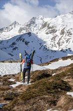 Ski tourers in winter in the mountains