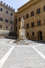 Monument to Salustio Bandini in front of the Monte dei Pasche di Siena banking house