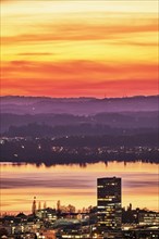 Evening mood with skyline and Lake Zug in the foreground the high-rise Parktower
