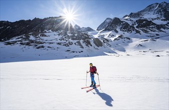Ski tourers climbing Alpeiner Ferner