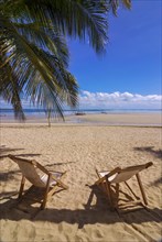 Sun loungers on the beach of Andilana