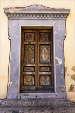 Old carved house entrance door