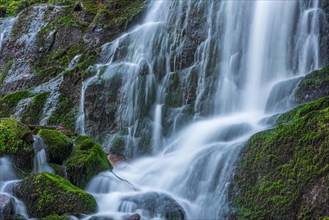 Fresh and beautiful waterfalls in a mountain stream in spring. La Serva