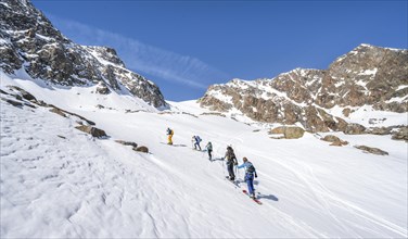 Group of ski tourers ascending the Berglasferner