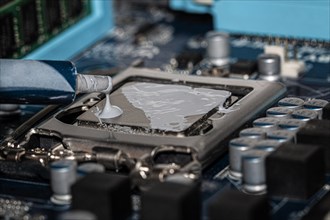 Thermal paste is applied to a processor