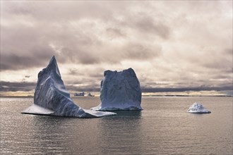 Icebergs floating in the open sea off Disko Island