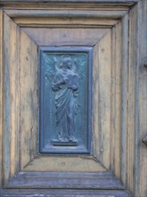 Depiction of an angel at the entrance gate