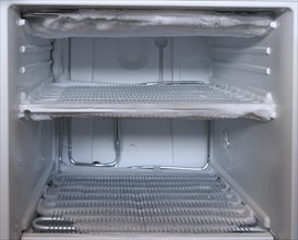 A very icy open freezer