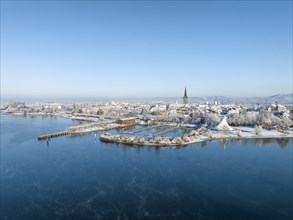Aerial view of the town of Radolfzell on Lake Constance in winter with the harbour pier and Waeschbruckhafen