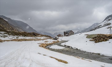 Oberbergbach and Franz-Senn-Huette mountain hut in winter