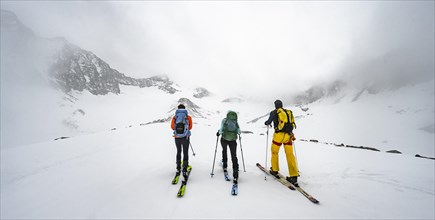 Three ski tourers climbing Sommerwandferner