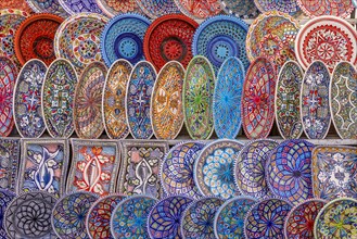 Coloured ceramic plates at the weekly market market in Portoferraio