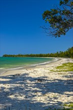 Long white sand beach in the east of the island Ile Sainte-Marie although Nosy Boraha