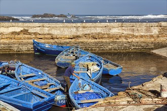 Traditional blue fishing boats in the harbour
