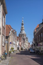 Town hall and historic house facades in Meelstraat