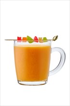 Spicy hot drink made of fresh oranges with anise flavour