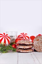 Stack of traditional German round glazed gingerbread Christmas cookie called 'Lebkuchen'