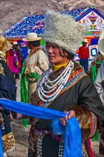 Traditional dressed woman on the festival of the tribes in Gerze Western Tibet