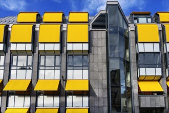 Facade of the Hypovereinsbank with yellow blinds