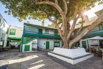 Picturesque white and green settlement called Pueblo Marinero designed by Cesar Manrique located in Costa Teguise