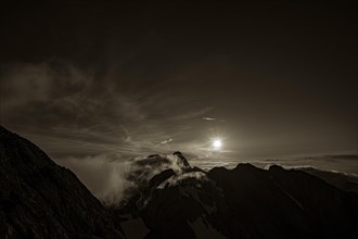 Summit of the Altmann with wispy clouds at sunrise