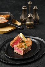 Roasted tuna steak medium rare on a plate