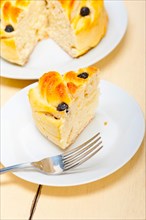 Fresh home baked blueberry bread cake dessert over white wood table