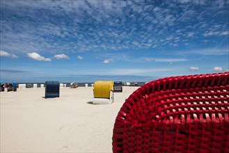 Beach chairs on the sandy beach