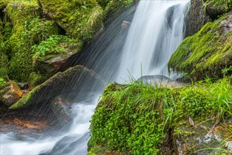 Fresh and beautiful waterfalls in a mountain stream in spring. La Serva