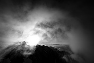 Summit of the Altmann with wispy clouds at sunrise