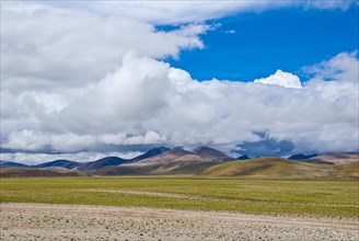 Open wide tibetan landscape along the road from Tsochen to Lhasa