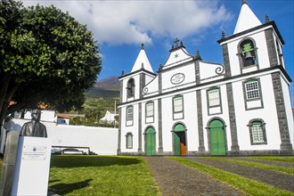 Paroquia de Sao Mateus church below Ponta do Pico highest mountain of Portugal