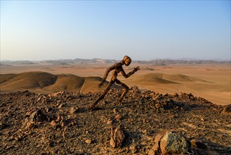 Stone man by artist RENN at Skeleton Coast View Point in the Namib Desert