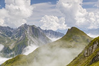 View from Gehrengrat over the fog-shrouded peaks of the Alps