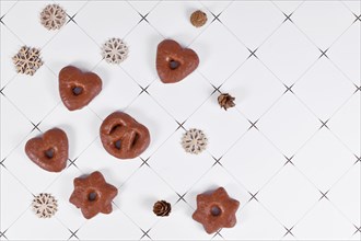 Top view of German glazed gingerbread Christmas cookies called 'Lebkuchen' in various shapes