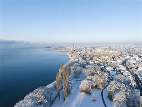 Aerial view from Mettnaupark to the town of Radolfzell on Lake Constance in winter