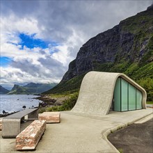 Ureddplassen rest area with wave-shaped concrete and glass toilet block