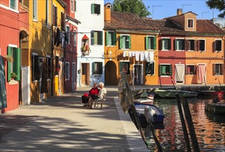 Colourful houses on the canal on the island of Burano
