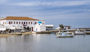 Old port of Mykonos with town hall and church of Saint Nikolaos of Kadena