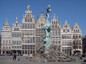 The Brabo Fountain and facades of the Guild Houses on the Grote Markt