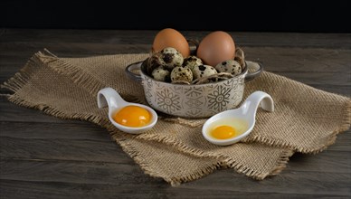 Fresh chicken and quail eggs prepared for cooking