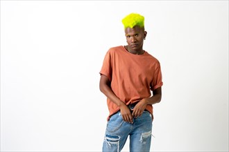 A gay black ethnicity man in studio with white background