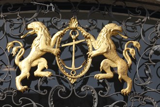 Coat of arms above the entrance door on the balcony of the town hall in Duesseldorf's old town