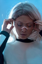 Portrait of woman with the futuristic glasses