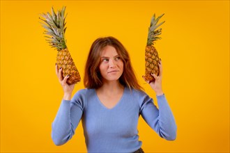 Woman with a pineapple in sunglasses